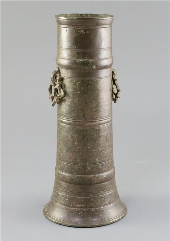 A 17th century Indian bronze vase, height 12in.